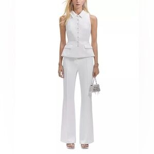 Self-Portrait
Button up vest top sleeveless with placket in white